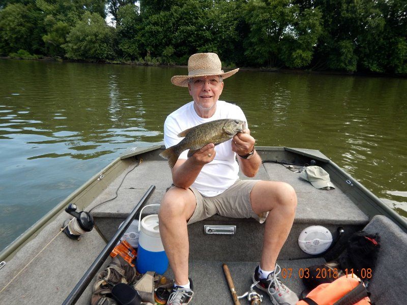 -Juniata River-002-.jpg - I got this one.  My wife hates that hat but it keeps the sun at bay.  Water was warm and cloudy. 